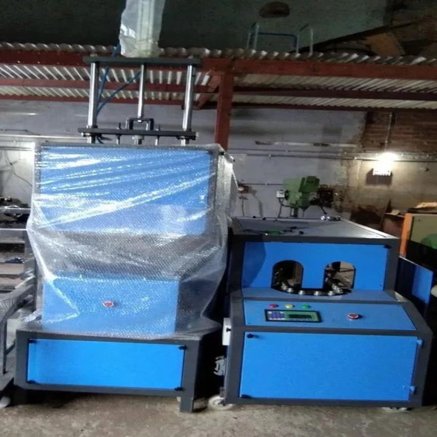 PET Blowing Bottle Machine, Production Capacity (Bottles/Hr): 1000
