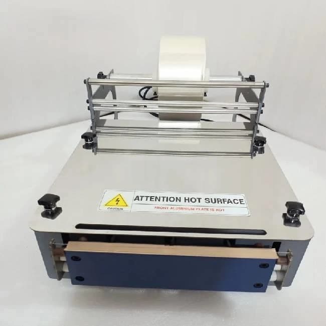 Sonic Industries Manual Cellophane Overwrapping Machine – Compact Wrapping for Boxes & Cartons