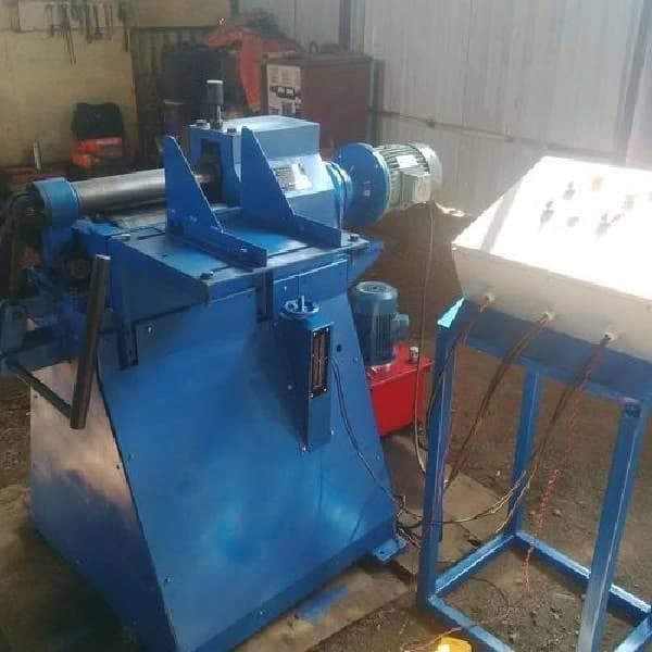 Sheet roll forming machine