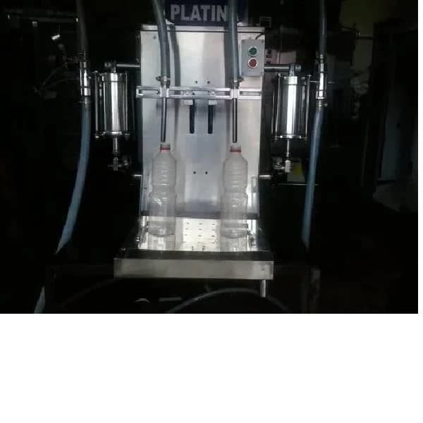 Automatic Bottle Filling Machine.