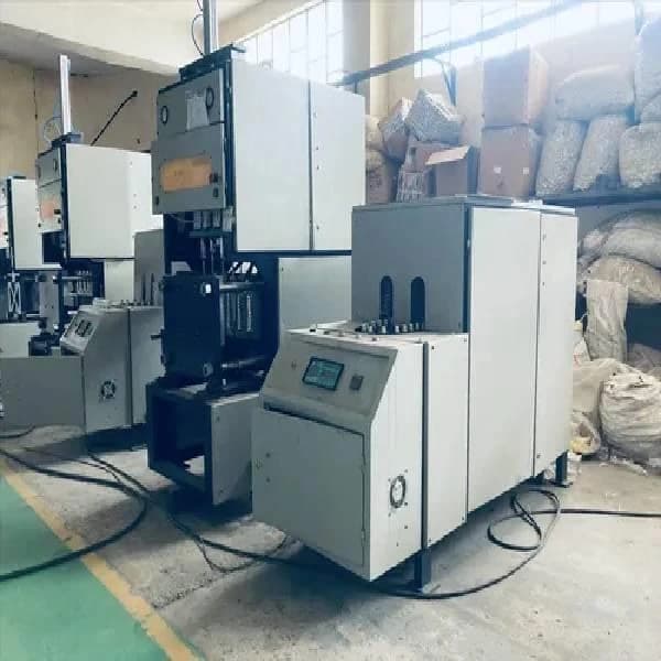 Semi Automatic 4 Cavity Auto drop PET Blow Moulding Machine