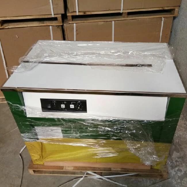 Box Strapping Machine