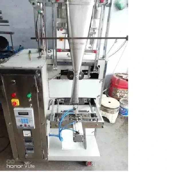 Pneumatic pouch packing machine