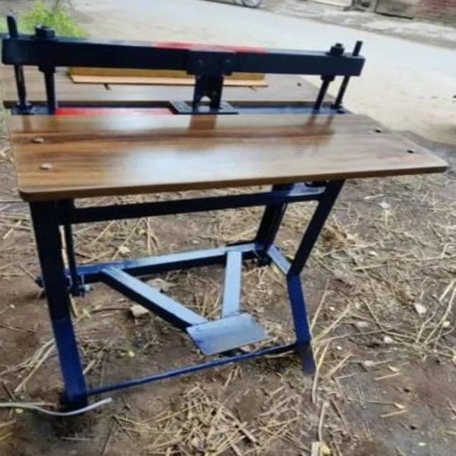 Foot operated round corner cutting machine