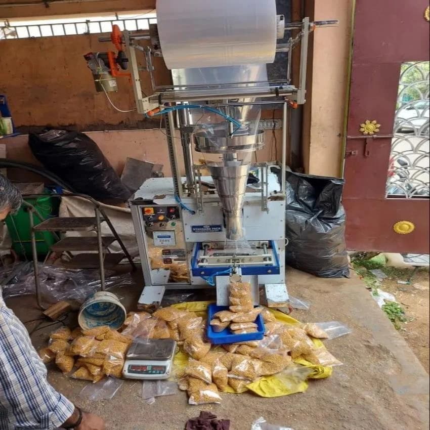 SPEC 1A Cup Filler Dal Rice Spices Grocery Packaging Machine, Capacity: 500-1000 pouch per hour